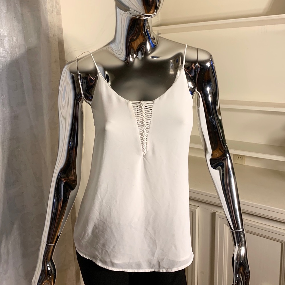 White sleeveless top
